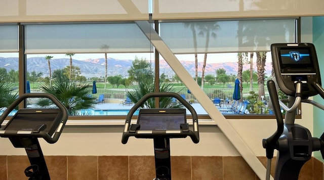 exercise room featuring a mountain view