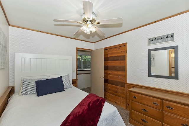 bedroom featuring crown molding, ceiling fan, and a closet