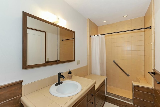 bathroom with vanity and curtained shower