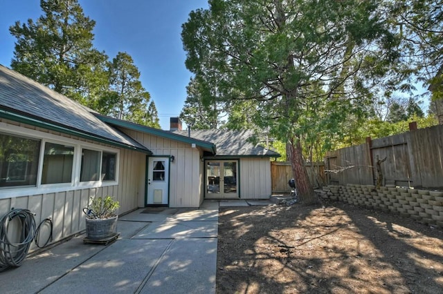 back of house with a patio