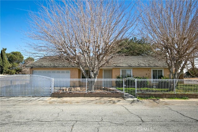 ranch-style home with a garage