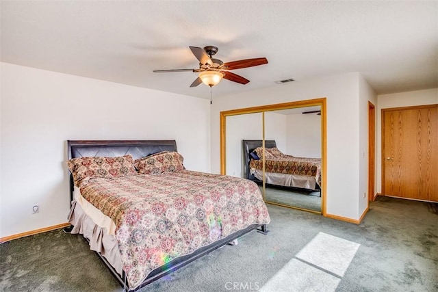 bedroom featuring carpet flooring, ceiling fan, and a closet