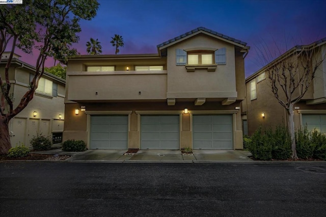 view of front of property featuring a garage