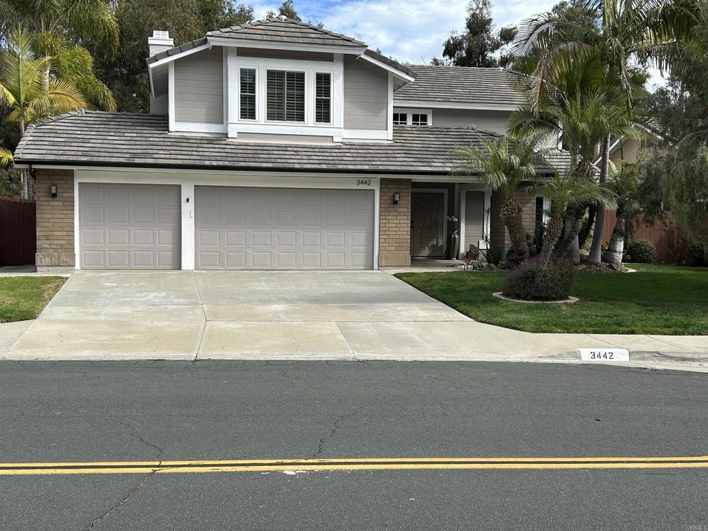 front of property featuring a garage