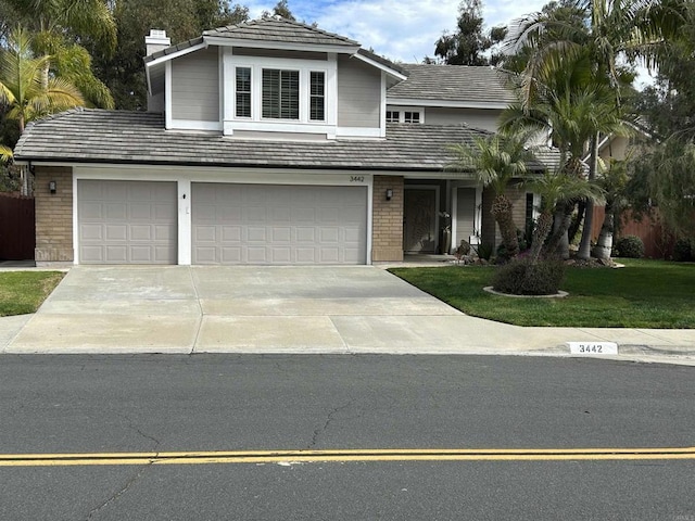 front of property featuring a garage