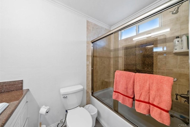 full bathroom with vanity, ornamental molding, shower / bath combination with glass door, and toilet