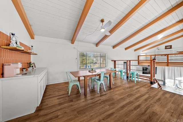 dining space with dark hardwood / wood-style flooring, lofted ceiling with beams, and ceiling fan