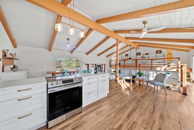 kitchen featuring white cabinetry, light stone counters, decorative light fixtures, ceiling fan, and stainless steel electric stove