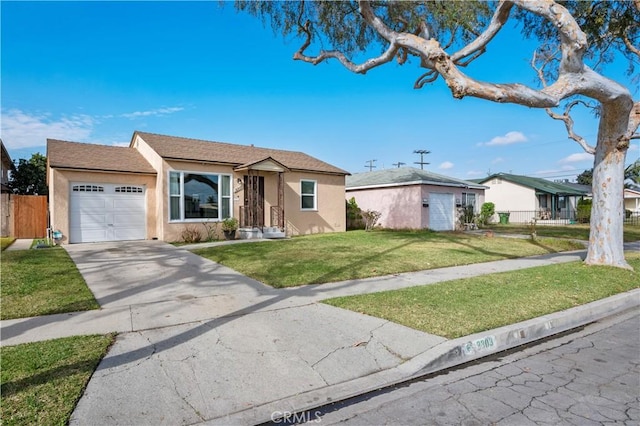 ranch-style house featuring a garage and a front lawn