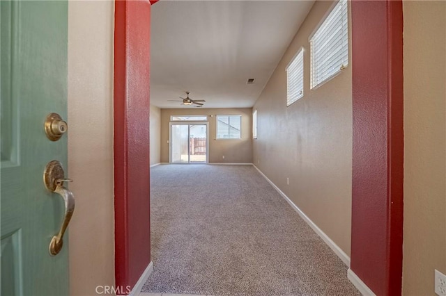 corridor with carpet floors