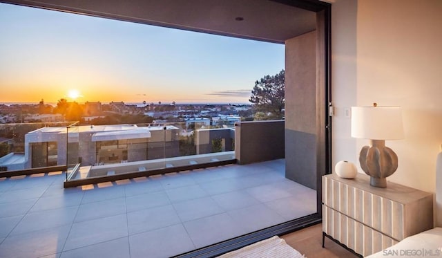 view of balcony at dusk