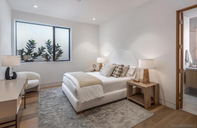 bedroom featuring light hardwood / wood-style floors