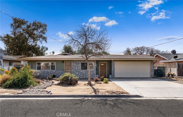 single story home featuring a garage