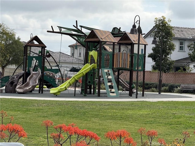 view of jungle gym with a yard