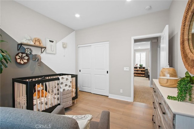 bedroom with light hardwood / wood-style flooring