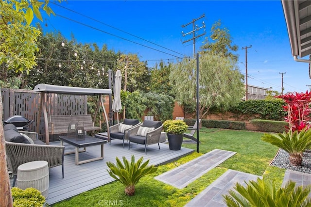 exterior space with a wooden deck and an outdoor living space