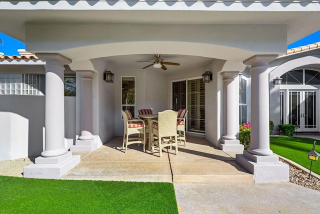 view of patio featuring french doors and ceiling fan