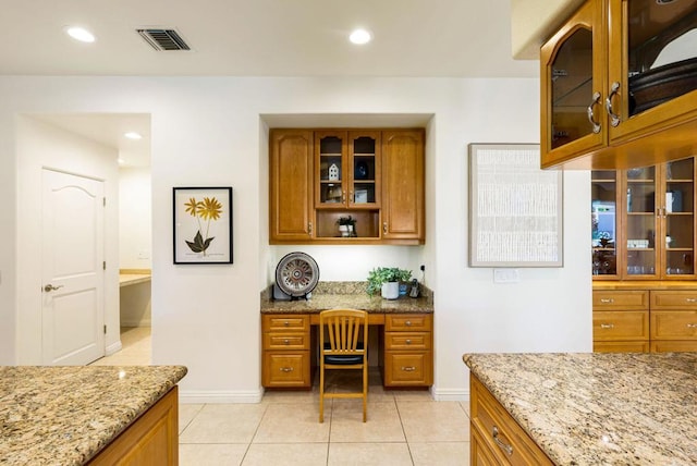 interior space featuring built in desk