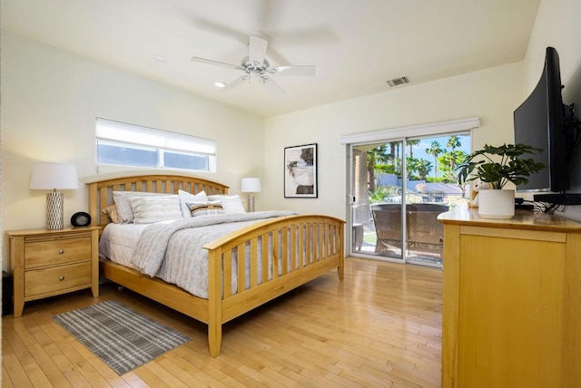 bedroom with ceiling fan, access to exterior, and light wood-type flooring