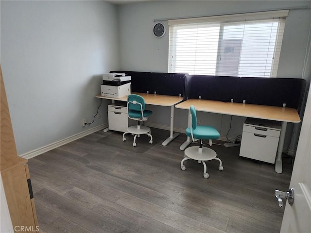 office area with baseboards and dark wood-style flooring
