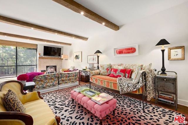 bedroom featuring beam ceiling and wood-type flooring