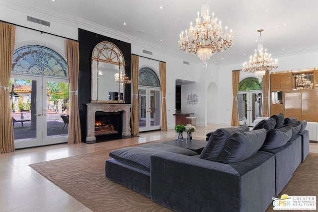 living room with french doors, ornamental molding, radiator, and a notable chandelier