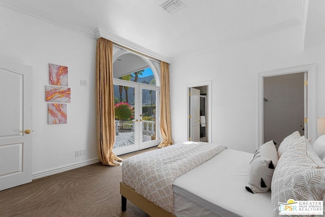 bedroom featuring dark colored carpet, ornamental molding, french doors, and access to outside