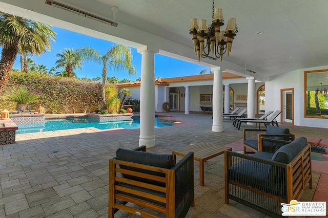 view of pool featuring a patio area