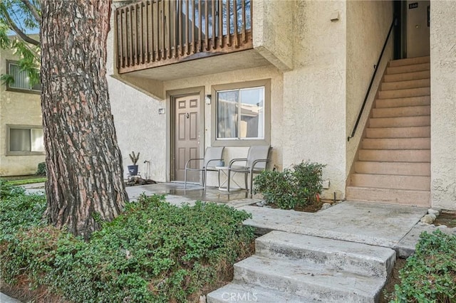 doorway to property featuring a balcony