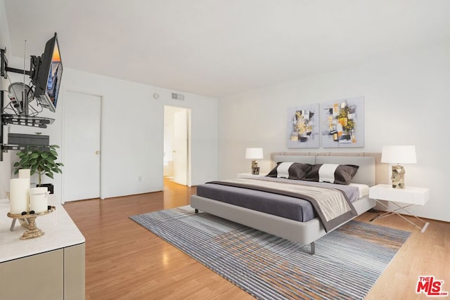 bedroom featuring light hardwood / wood-style flooring