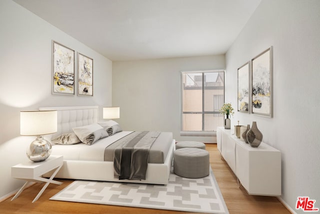 bedroom featuring light hardwood / wood-style flooring