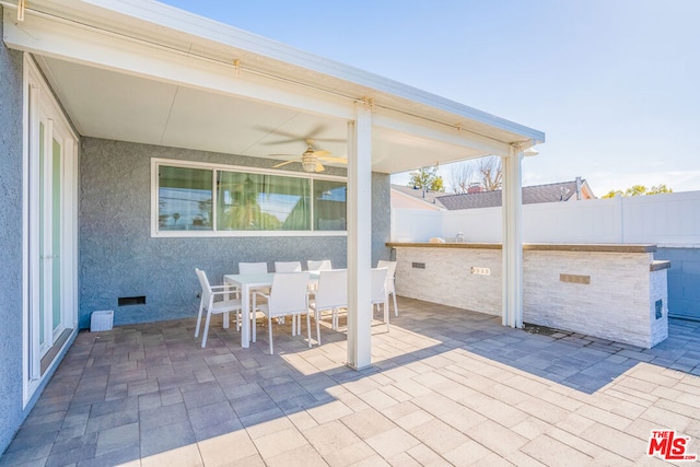 view of patio / terrace with ceiling fan