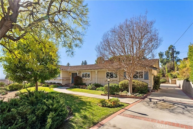 view of front of home with a front yard