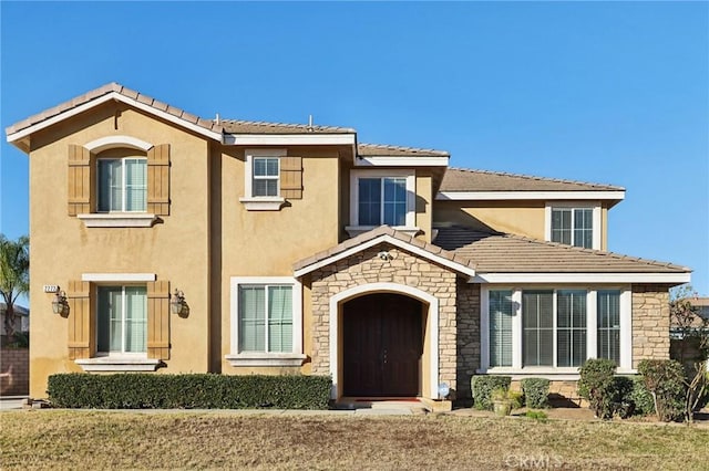 view of front facade with a front lawn