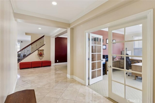 hallway with crown molding and french doors