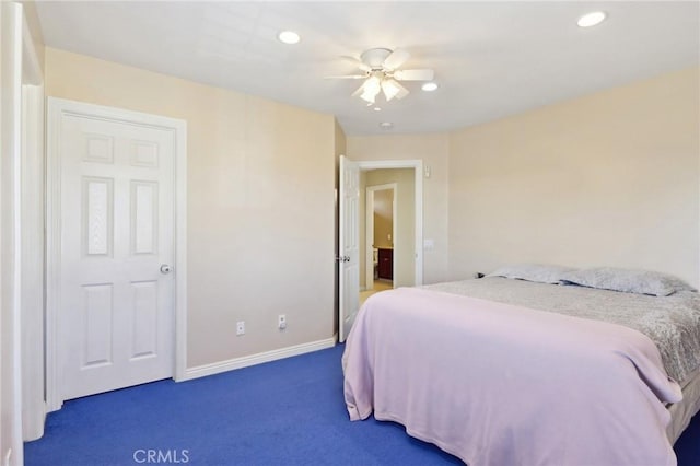 carpeted bedroom with ceiling fan