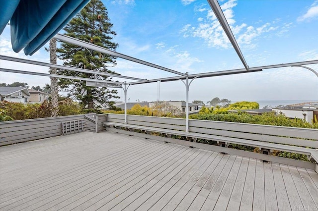 deck featuring a water view