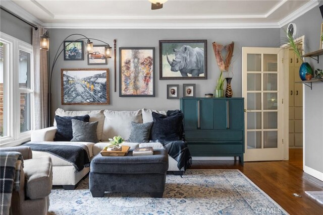 sitting room featuring dark hardwood / wood-style flooring and crown molding