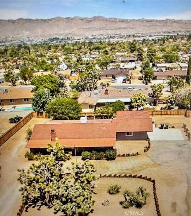 drone / aerial view featuring a mountain view