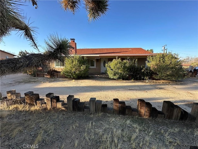 exterior space with a chimney