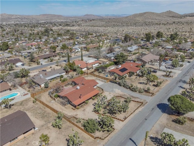 56766 Golden Bee Dr, Yucca Valley, CA 92284 - aerial perspective of suburban area featuring a mountain backdrop
