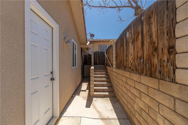 56766 Golden Bee Dr, Yucca Valley, CA 92284 - view of home's exterior featuring stucco siding and fence
