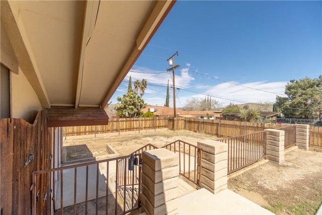 56766 Golden Bee Dr, Yucca Valley, CA 92284 - view of patio with a fenced backyard