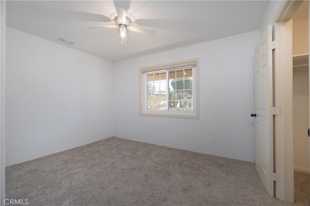 56766 Golden Bee Dr, Yucca Valley, CA 92284 - carpeted spare room with ceiling fan