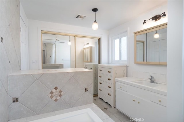 56766 Golden Bee Dr, Yucca Valley, CA 92284 - full bath with tile patterned floors and two vanities