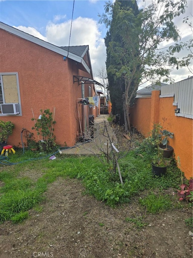 view of home's exterior with cooling unit