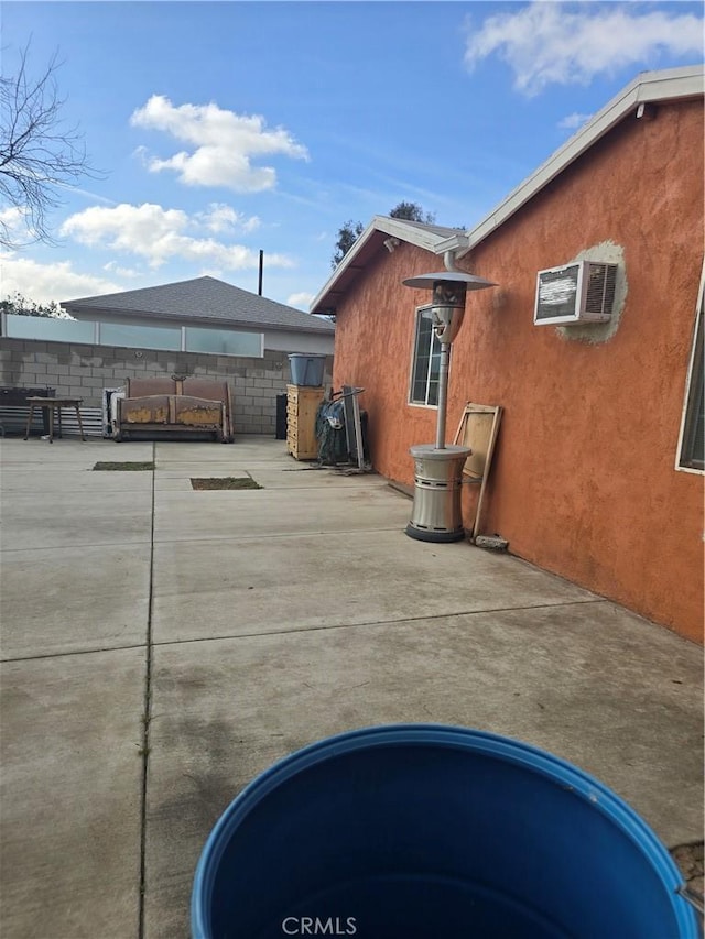 view of home's exterior featuring a patio