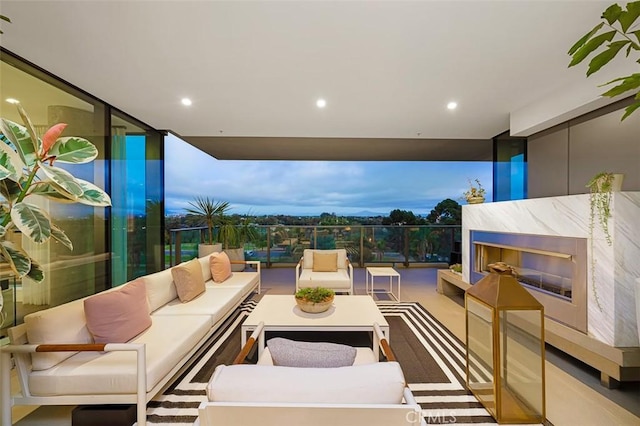 patio terrace at dusk with an outdoor hangout area