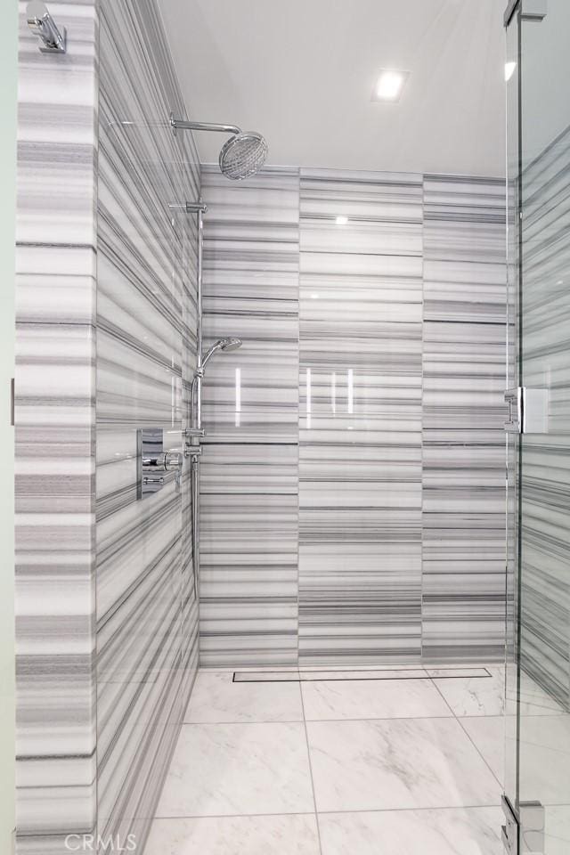 interior space with a tile shower