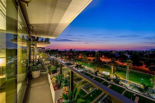 view of balcony at dusk